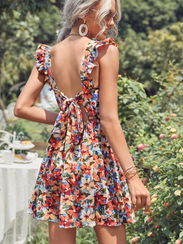 Vestido Modelo Acinturado Rodado Curto Estampa Floral Costas Nuas com Laço Alça de Babado