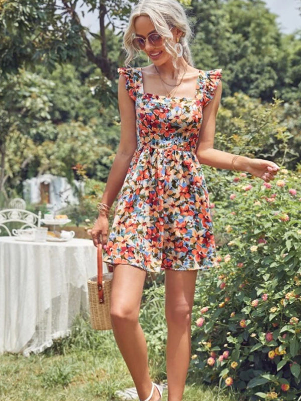 Vestido Modelo Acinturado Rodado Curto Estampa Floral Costas Nuas com Laço Alça de Babado