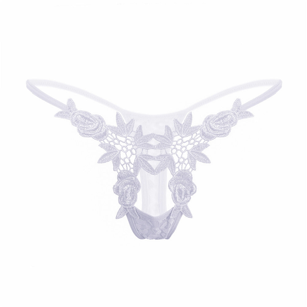 Calcinha sexy, erótica, de renda, vazada e com detalhes. Cor: Branco.