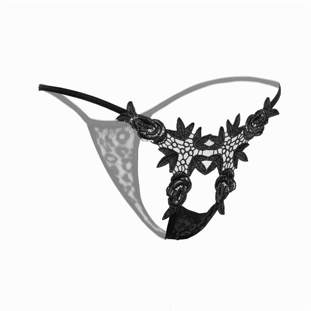 Calcinha sexy, erótica, de renda, vazada e com detalhes. Cor: Preto.