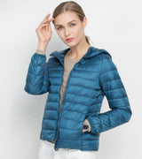 Jacqueta Puffer c/Capuz ultra leve azul petróleo 