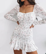 vestido curto branco floral acinturado manga longa decotado 